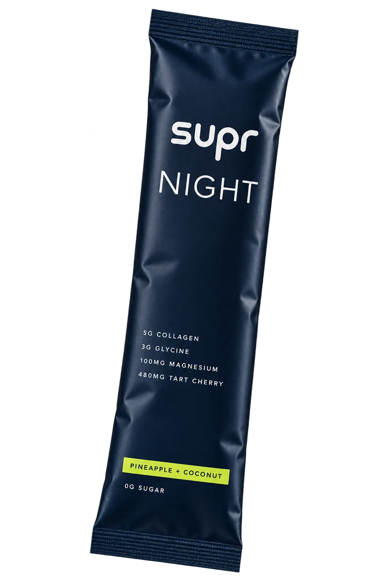 Concept matte navy supr NIGHT sachet with white lettering and a chartreuse Pineapple + Coconut flavor stripe